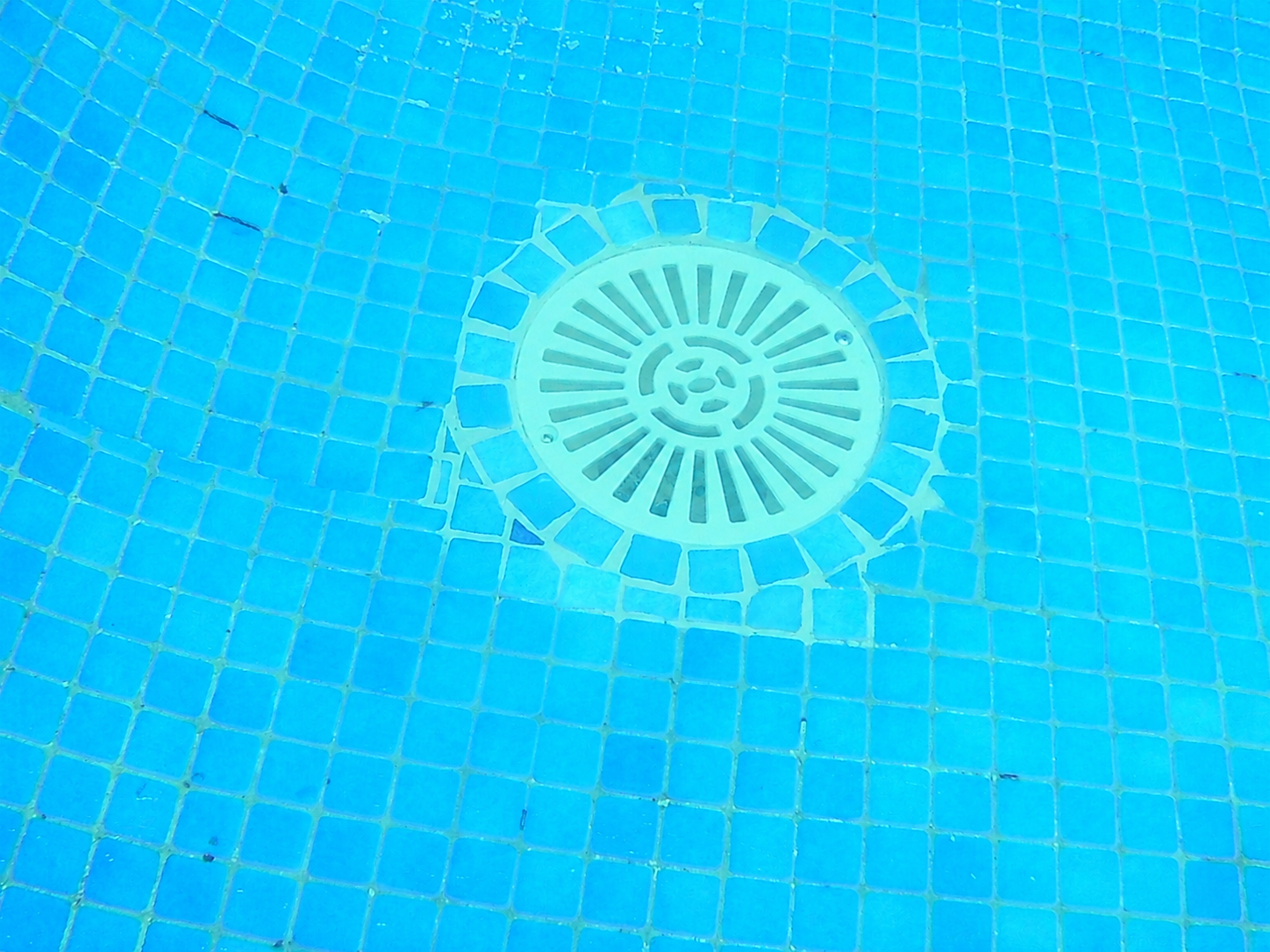 Completed underwater repair around a swimming pool drain